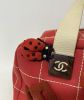 Сумка Chanel. Текстиль з брошками